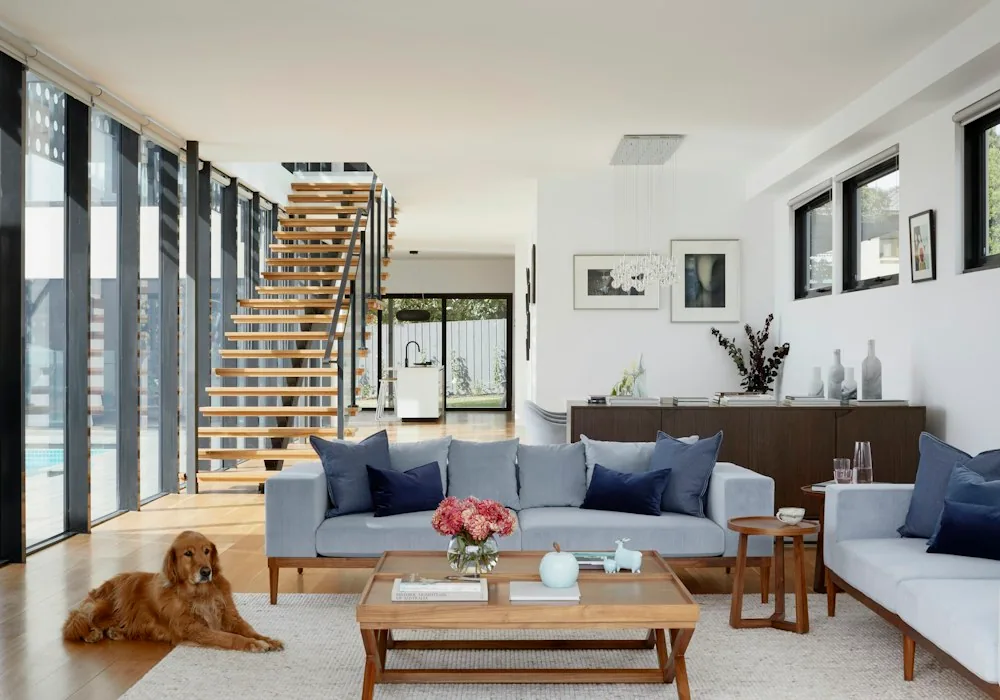 A bright living room with large windows